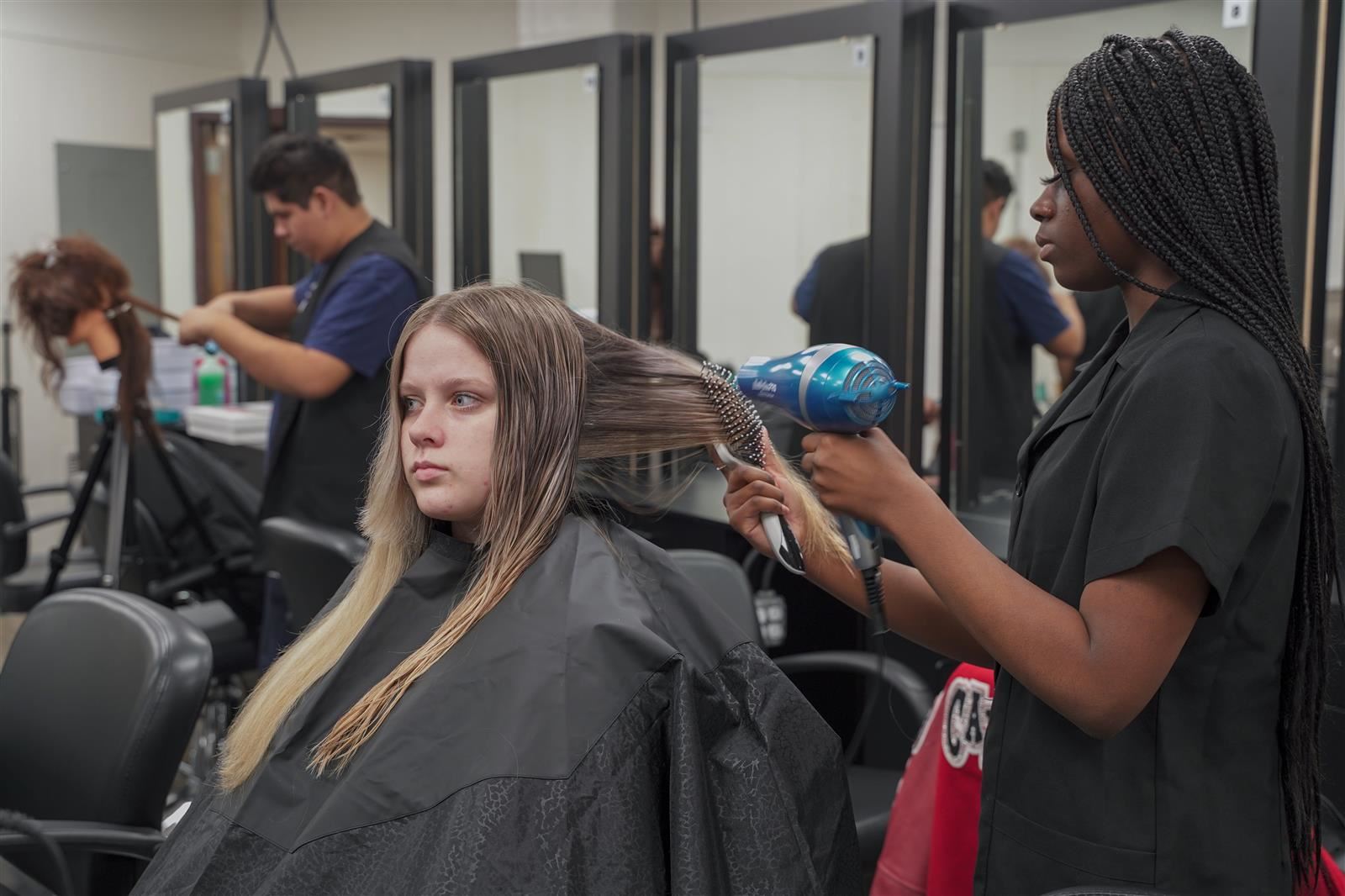 Cosmetology Students Hair Drying